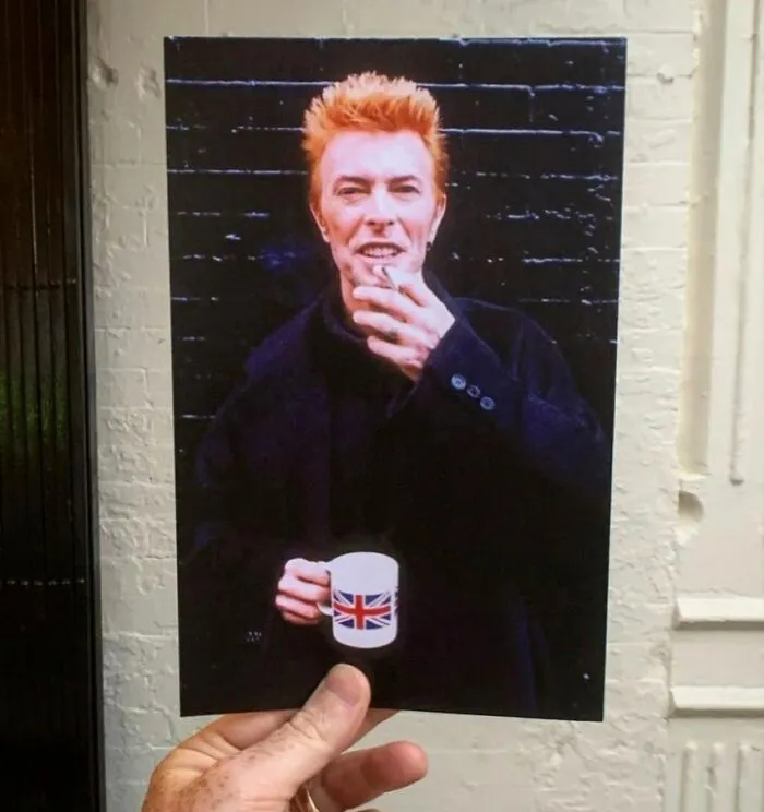 Here David Bowie Is Outside Of Tea And Sympathy In NYC, January 10th, 1997. Taken By Kevin Cummins