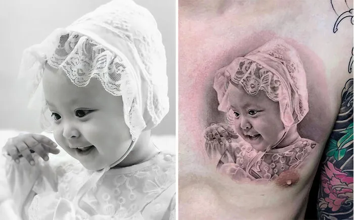 Hyper-realistic tattoo of a smiling baby in lace bonnet, resembling an imprint on the skin.