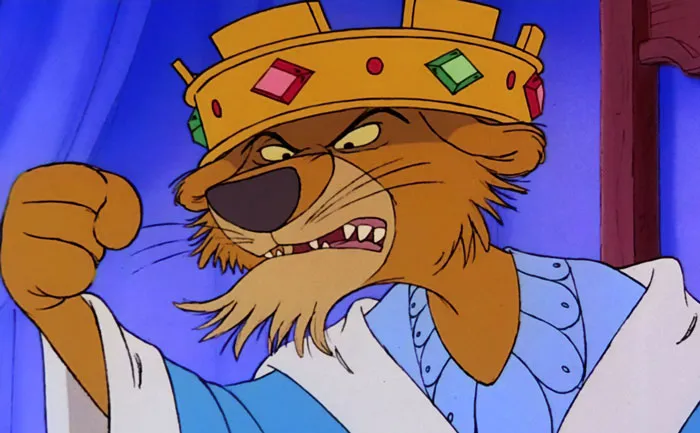 Prince John wearing a crown with gems 