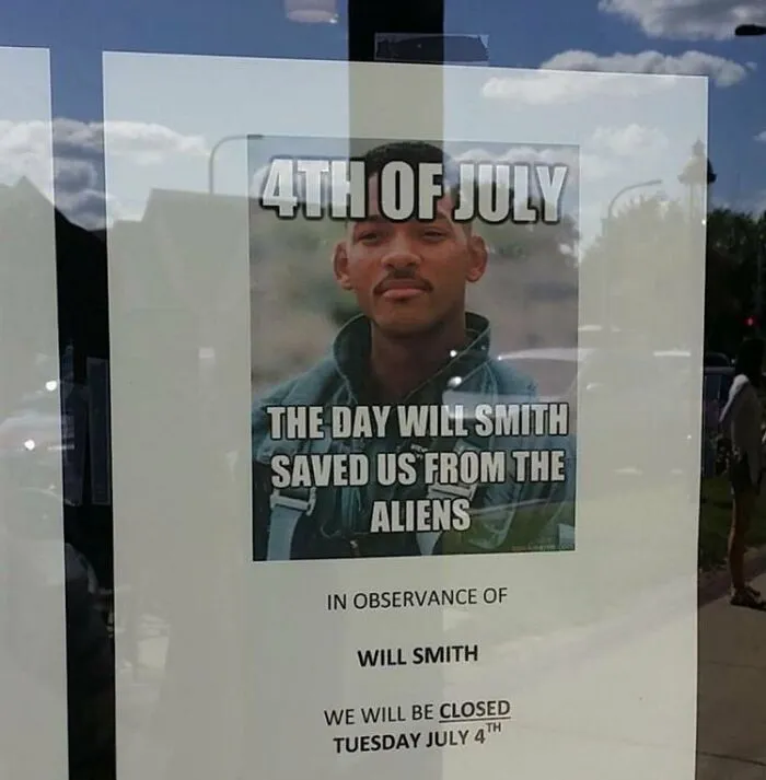 Funny sign with Will Smith meme declaring closure on July 4th, humorously celebrating his fictional heroics.