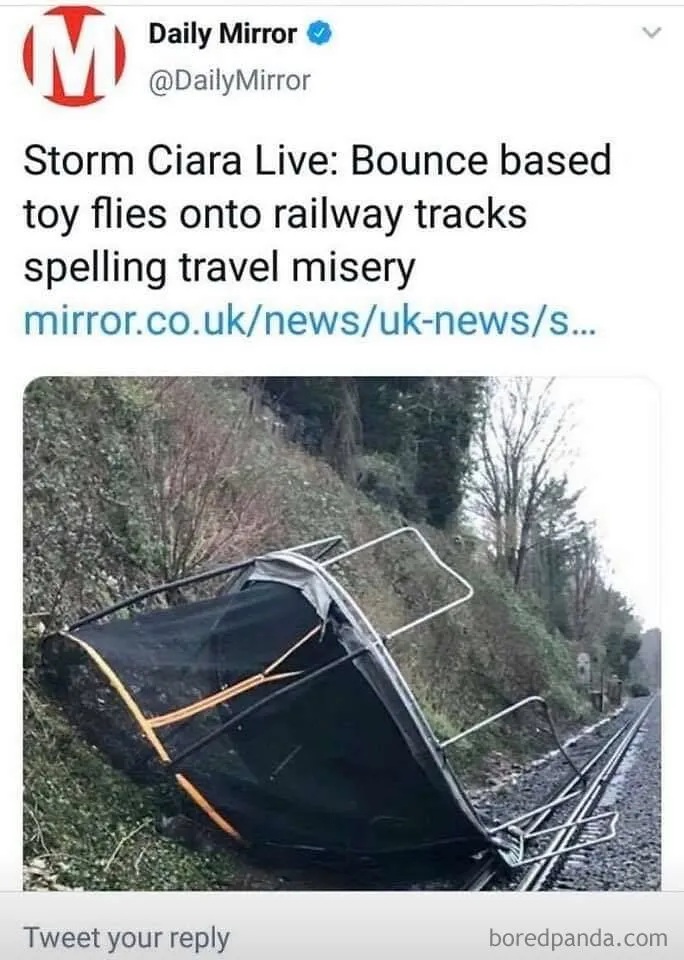 Trampoline on railway tracks after storm, described humorously as "bounce based toy," highlighting funny failure.