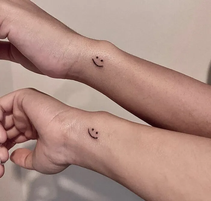Matching Little Smiley Tattoos