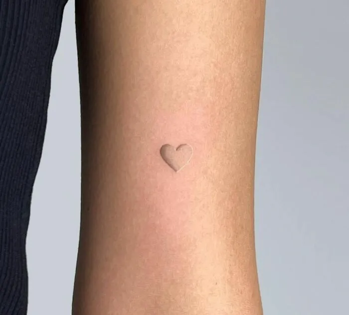 Minimalist Heart Tattoo