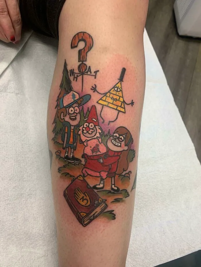 Cartoon tattoo featuring characters from a beloved animated show, colorful design on a person's arm.
