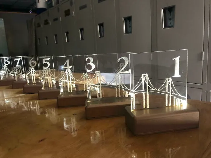 My Sister Wanted Lit LED Table Numbers So I Put These Together For Her! The Bases As 3D Printed To Hide The Wires. My Daughter (Their Niece) Sketched The Bridge Where They Got Engaged And I Then Laser Engraved The Sketch Into Clear Acrylic So It Would Glow. Really Happy With How These Turned Out!