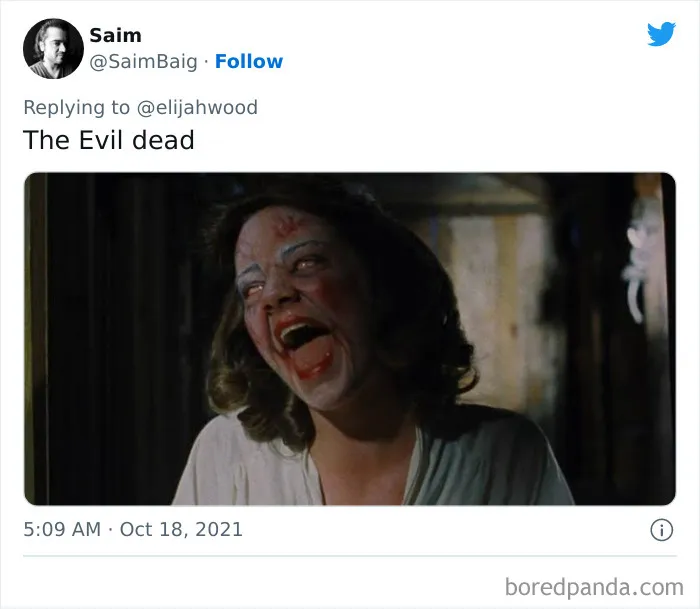 Horror film single shot from The Evil Dead showing a bloodied woman with a haunting facial expression.