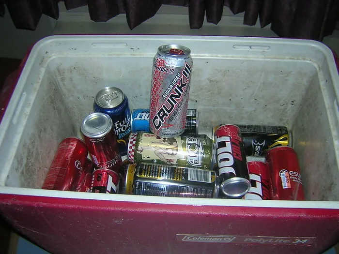 A cooler filled with various drink cans, highlighting bizarre and unlikely personal stories.