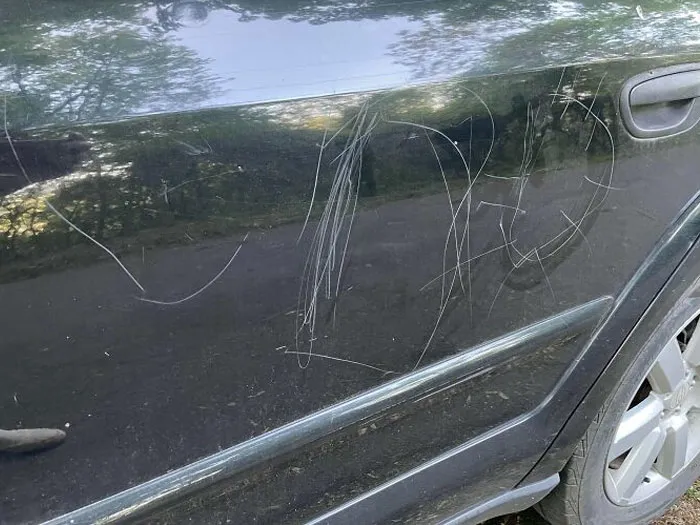 Neighbor's Kid Decided To Decorate My Car With A Rock To Make It Look "Cute"