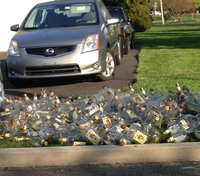 My Neighbor Down The Street's Recycling Pile Must Be Over 100 Empty 1/2 Gallon Bottles Of Captain Morgans Rum. The Recycle Bin Was Full As Well. A Lot Of Captains In Him