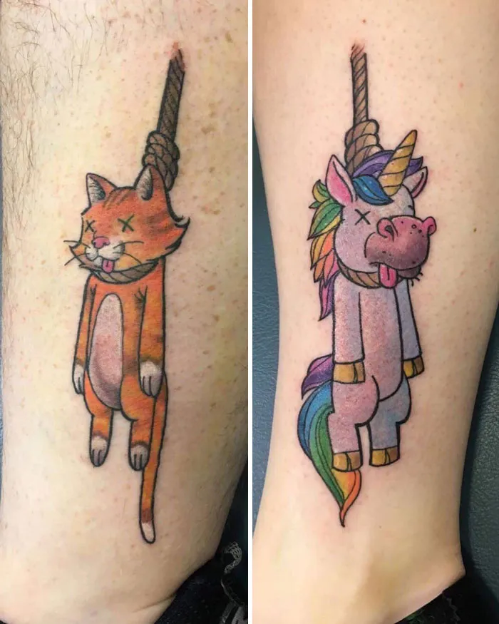 Friendship tattoos featuring a cartoon cat and unicorn with funny expressions on two different arms.