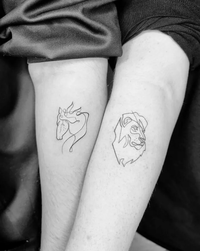 Two forearms featuring intricate single-line tattoos of a horse and a lion.