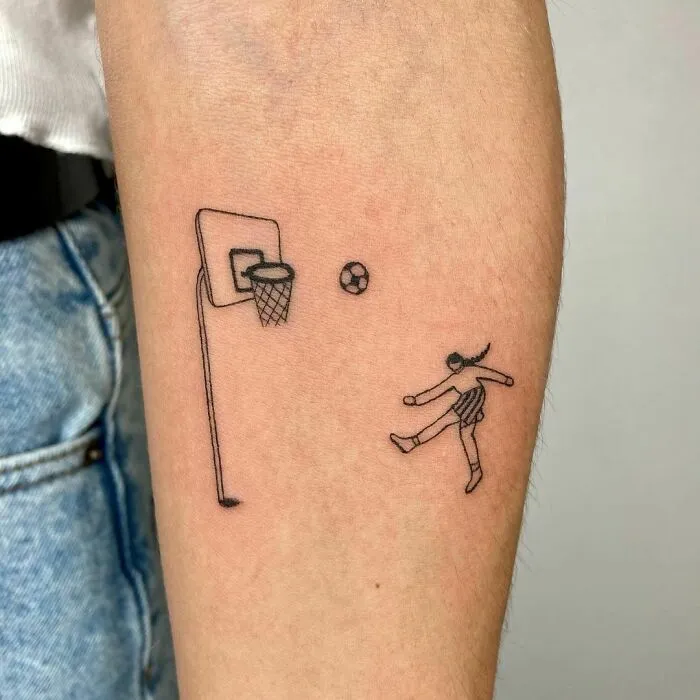 Minimalist tattoo of a person kicking a ball towards a basketball hoop on arm.