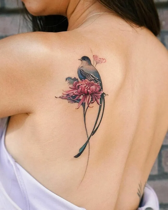A Longtail Bird, Dainty Flow And Japanese Chrysanthemum