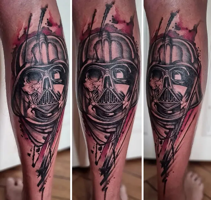 Detailed calf tattoo featuring a striking design with a bold character illustration, showcasing true coolness.