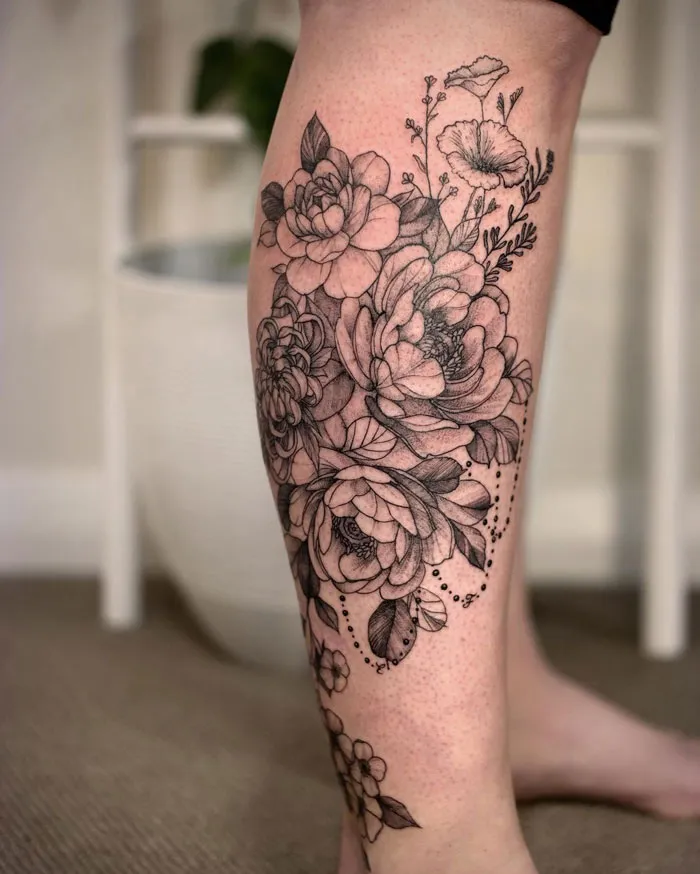 Fine Line Flowers Tattoo On Calf Done At Pilar Alexis Lannon