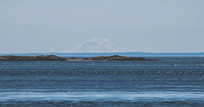 You Can See Mount Rainier From Canada, But Because Of The Earth's Curvature You Can Only See The Tip