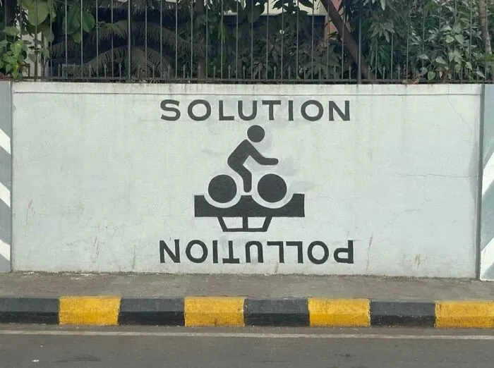 “Solución/Contaminación” en una pared de Francia 