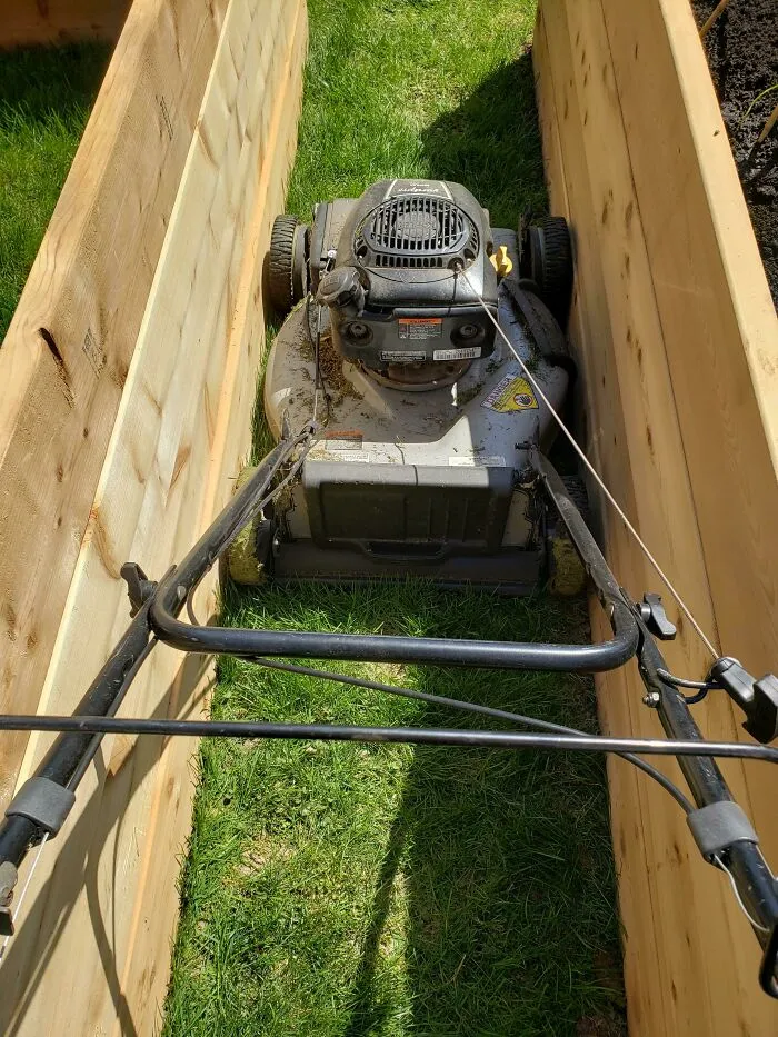Just Build Raised Garden Beds. Figured I'd Lay Rock Between Them Instead Of Grass Maintenance. Got A Surprise Unplanned Perfect Fit With The Lawn Mower