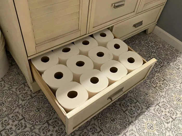 The Way This Toilet Paper Fits In The Vanity Drawer