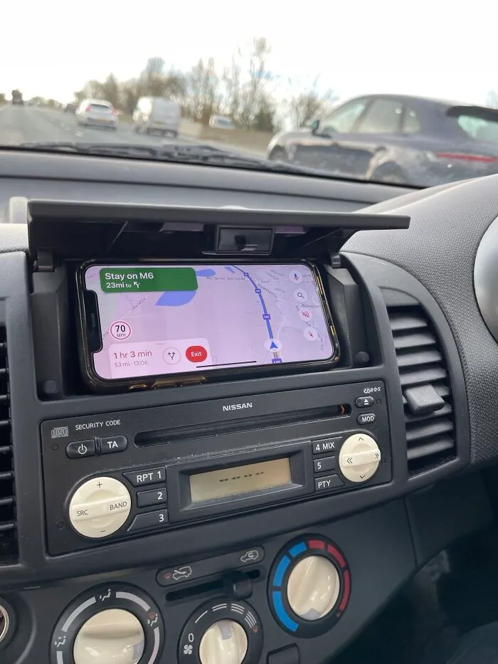 The Way My Son’s iPhone 11 Fits Into This Compartment In Her 20-Year-Old Nissan Micra