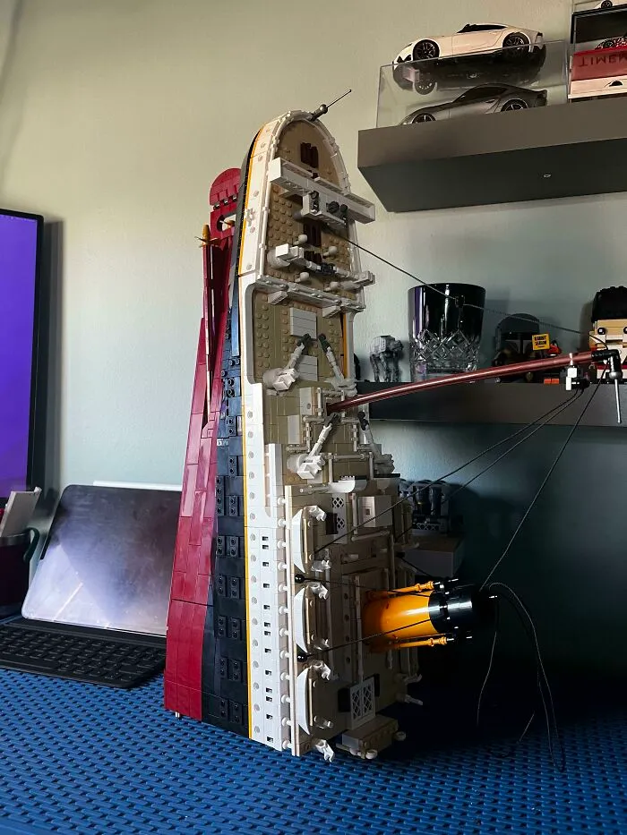 Detailed LEGO build of a ship's interior and exterior, showcasing incredible craftsmanship and intricate design elements.