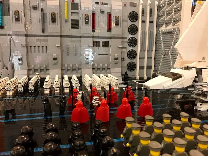 LEGO builds depicting a detailed Star Wars scene with stormtroopers and imperial guards in a large model setting.