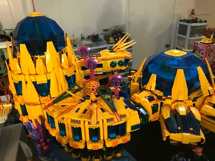 Intricate LEGO builds featuring futuristic yellow and blue structures showcasing incredible LEGO builds as real works of art.
