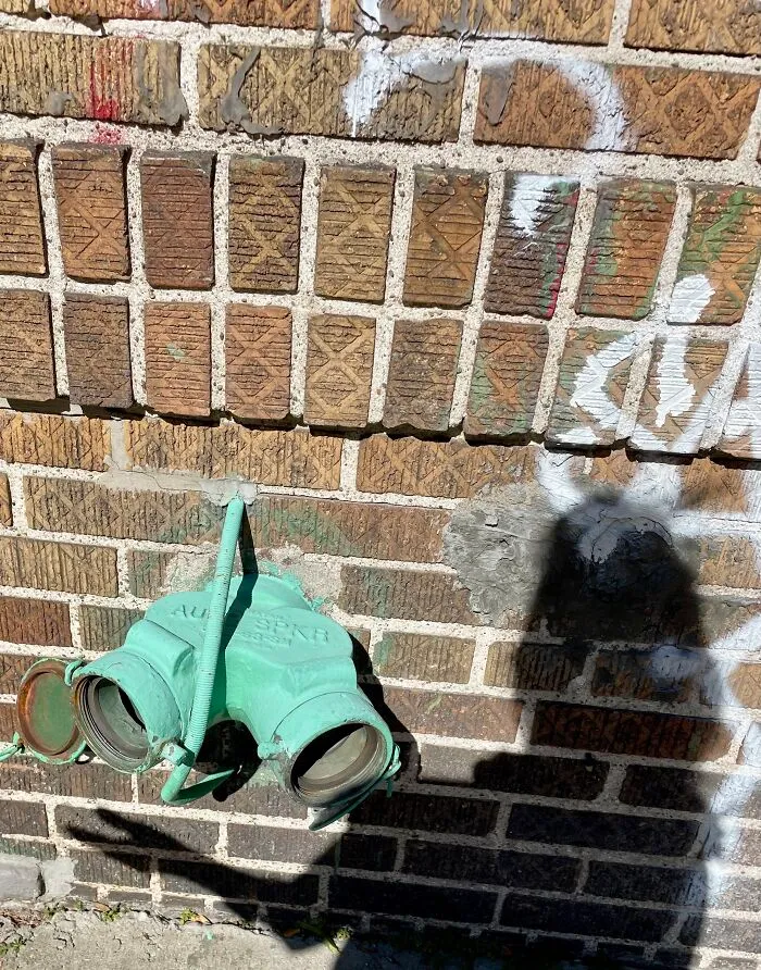 Beautiful Sea-Foam Green Standpipe With Open Covers With My Shadow Cradling It