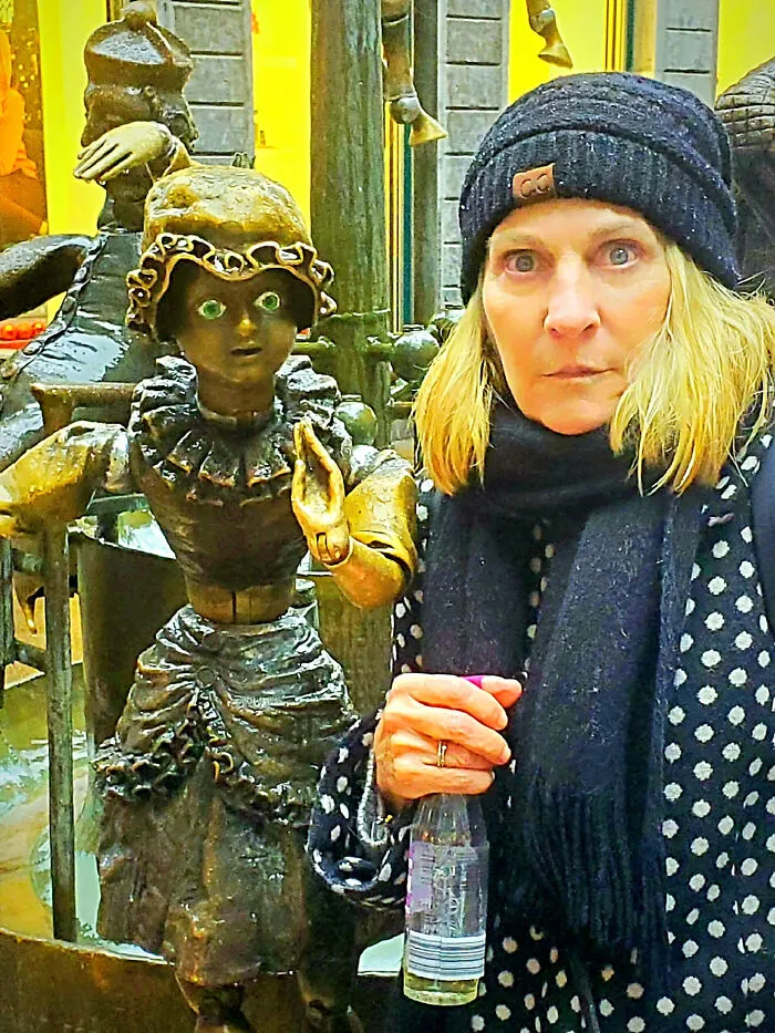 My Wife Perfectly Imitating The Figure Behind Her