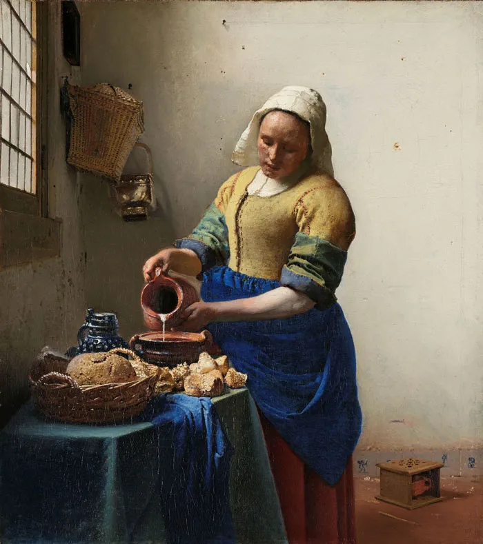 A woman in historical attire pours milk in a famous portrait painting.