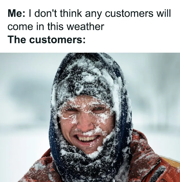 Person smiling despite being covered in snow, representing Canadian life through a humorous meme.