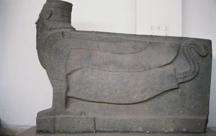 Rock statue of Scorpion Man in a museum 