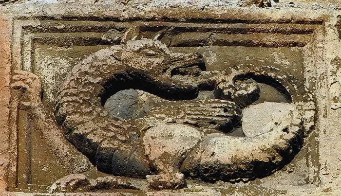 Engravings of Ouroboros on a rock 