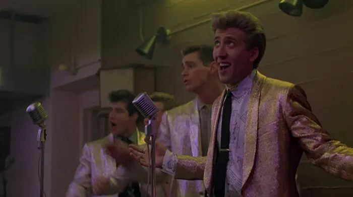 Nicolas Cage, Jim Carrey, Harry Basil y Glenn Withrow en Peggy Sue se Casó (1986)