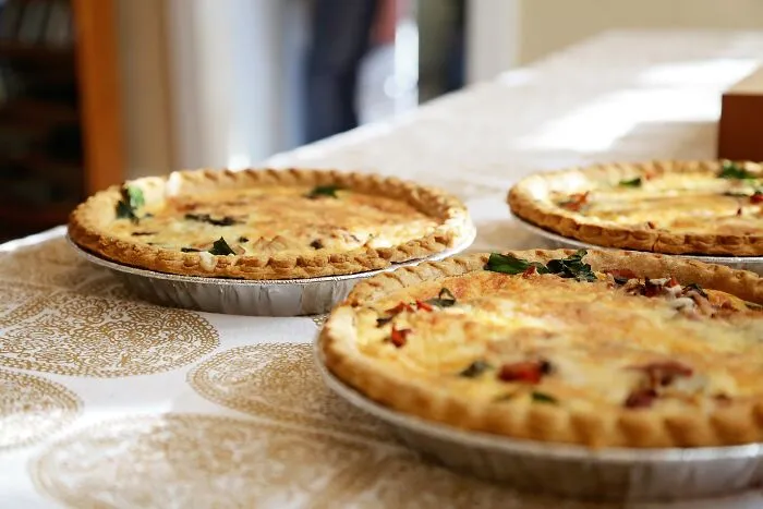 Three Fres Baked Pies On The Table 