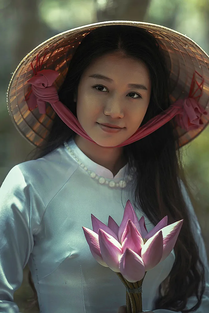 Woman wearing hat and looking