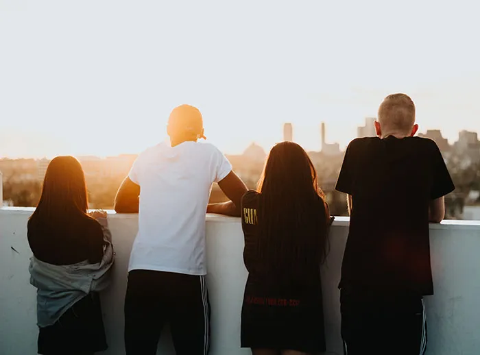 Friends standing and looking