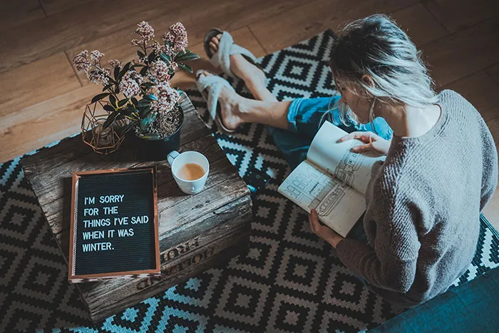 Woman sitting and reading