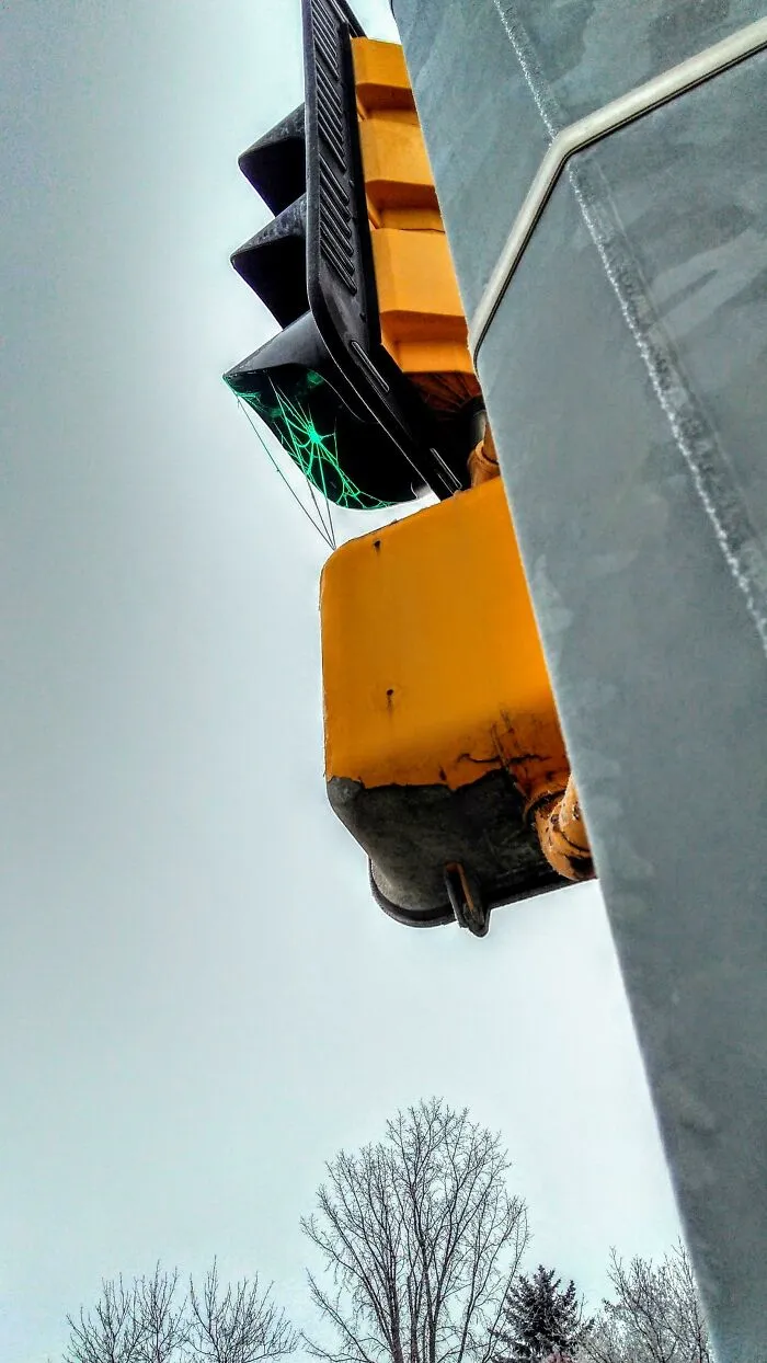 ITAP Of A Spiderweb On A Traffic Light