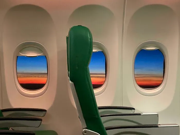 ITAP Of The Sunset Inside An Almost Empty Plane