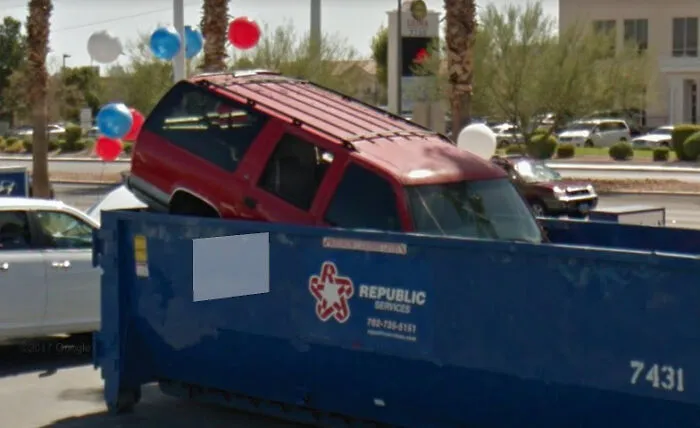 SUV In A Dumpster