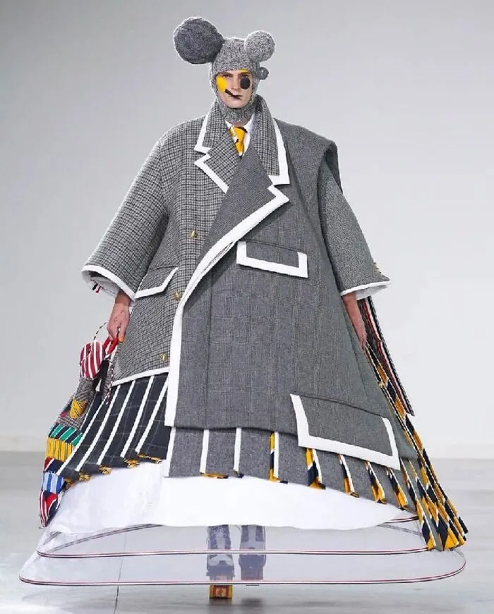 This Is From Thom Brown’s Ready To Wear Collection. Did Mickey Mouse Get Drunk And Tried On Minnie’s Clothes Before Getting Into An Bar Fight?