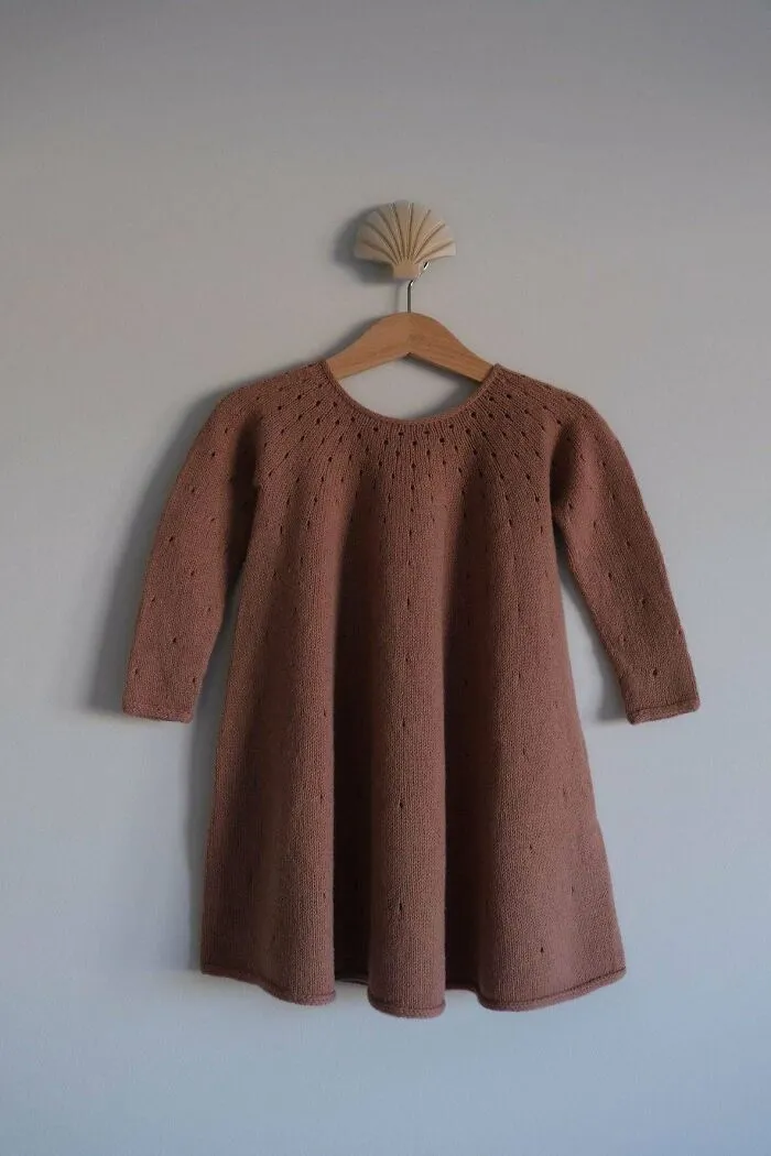 He tejido este vestido para mi hija. Ella estaba muy orgullosa, y decía: “Mi papá hizo esto para mí” 