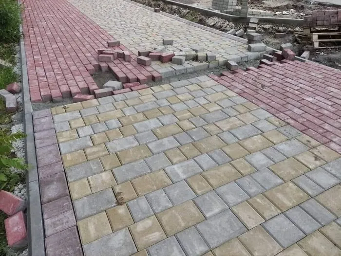 Two Teams Of Builders Was Building A Bike Lane "On The Right-Hand Side" (Mariupol, Ukraine)