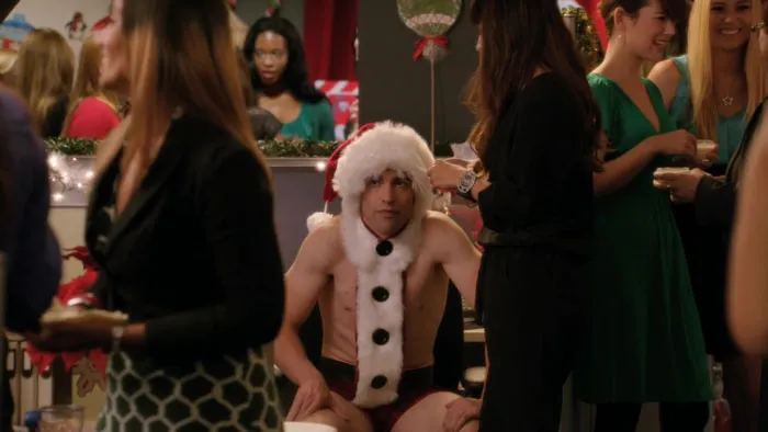 Schmidt wearing Santa's cap 