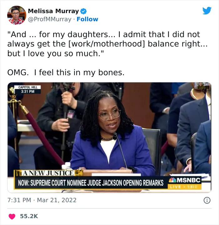 A woman in a blue suit speaks at a public hearing, discussed on a post about average parent problems.
