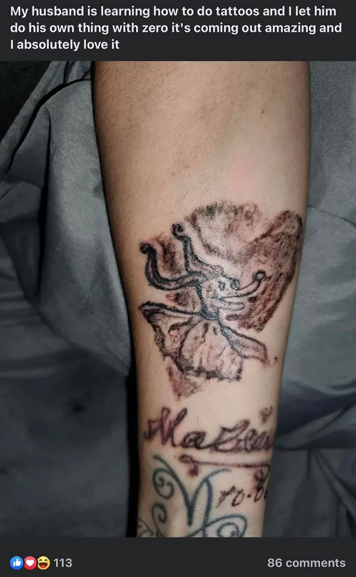 Amateur tattoos on a forearm with abstract design and text.