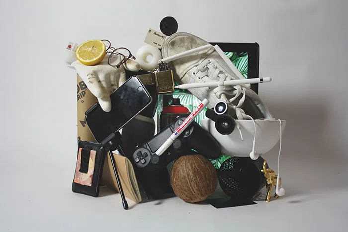 Various items for enjoying “me time,” including shoes, a game controller, and headphones.
