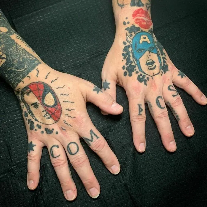Marvel tattoos on hands featuring Spider-Man and Captain America designs.