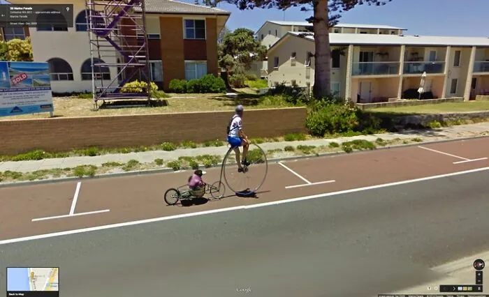 Penguin And Penny Farthing